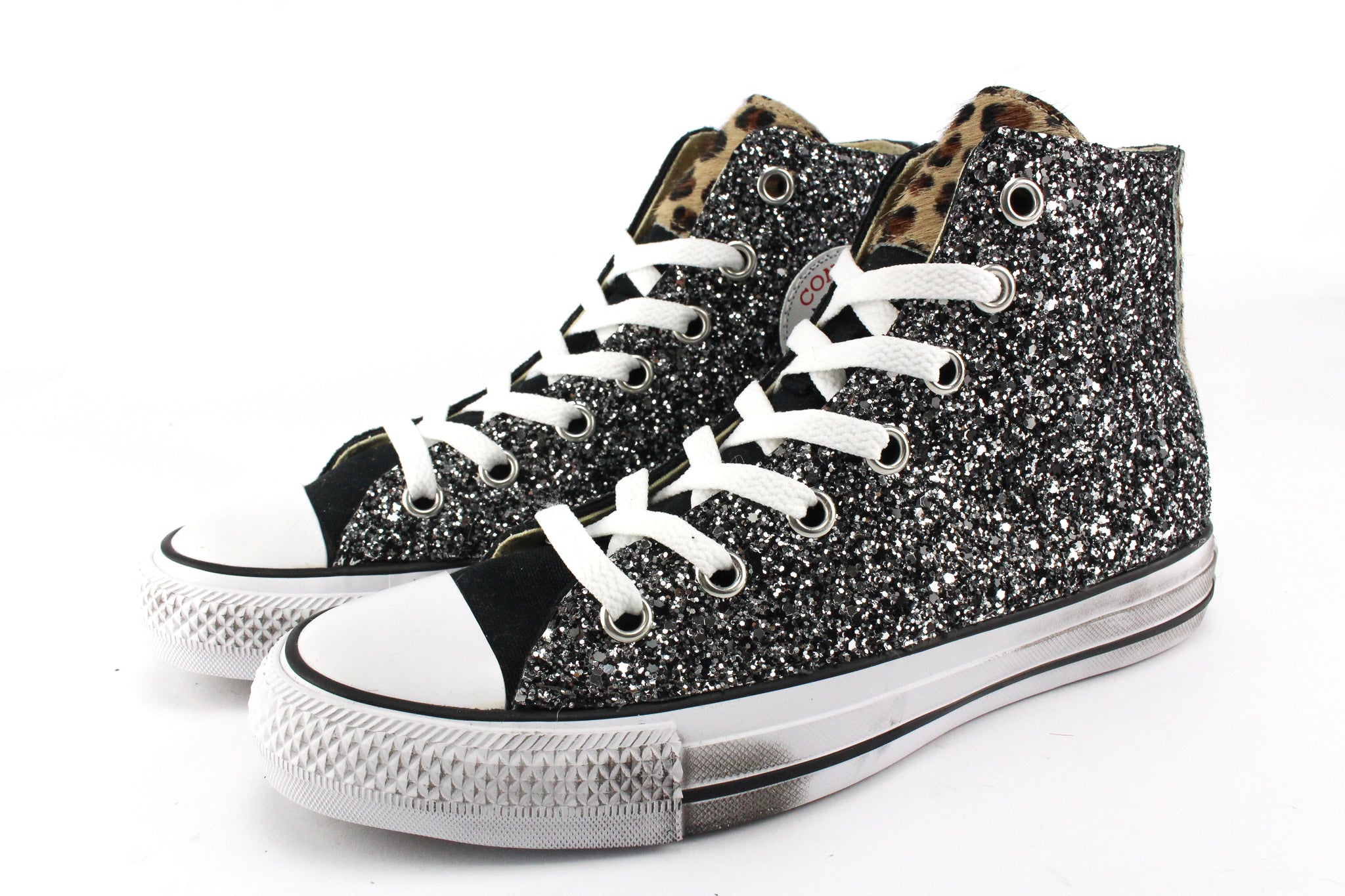 Converse shops nere in pelle